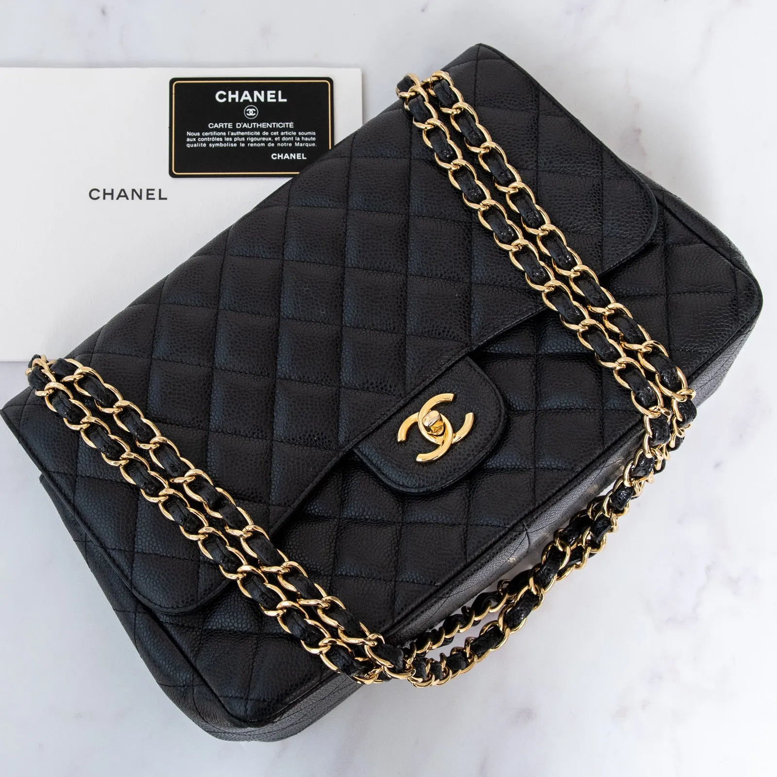 Chanel Black Jumbo Classic  Double Flap Bag In Caviar Leather With Gold Tone Hardware