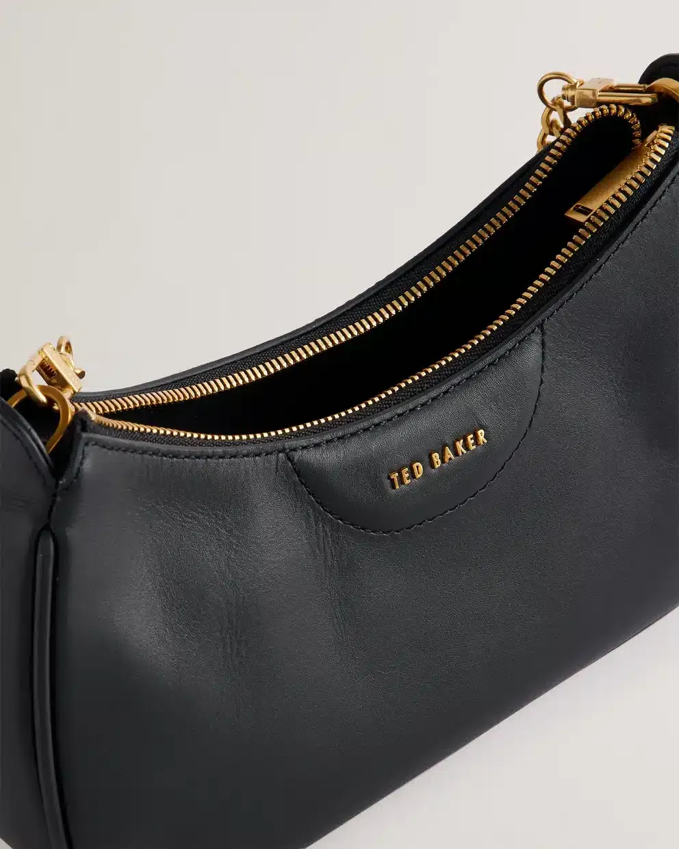T.E.D B.A.K.E.R CROSS BODY BAG