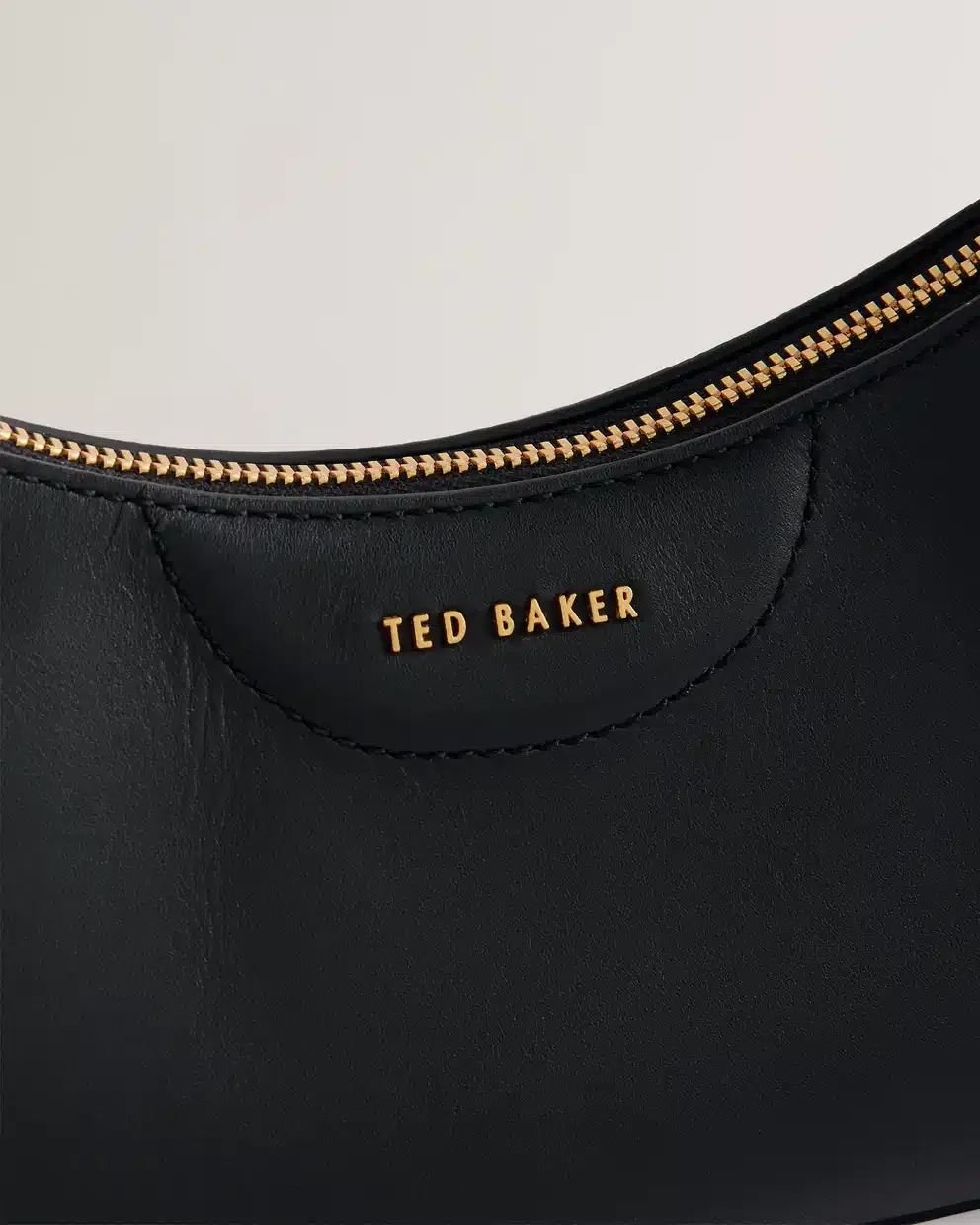 T.E.D B.A.K.E.R CROSS BODY BAG